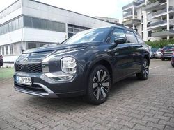 Grau Gebraucht 2025 Mitsubishi Outlander P-HEV Top SUV | 56.230 €