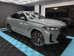Grau Gebraucht 2024 BMW X6 M Sport SUV | 77.870 € (Etwas zu teuer)