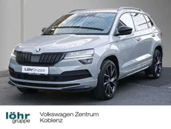 Steelgrau Gebraucht 2021 Skoda Karoq SportLine SUV | 33.980 € (Etwas zu teuer)