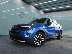 Blau Gebraucht 2023 Opel Mokka-e Elegance SUV | 24.649 € (Teuer)
