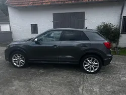 Grau Gebraucht 2024 Audi SQ2 Sport SUV | 39.700 € (Guter Preis)