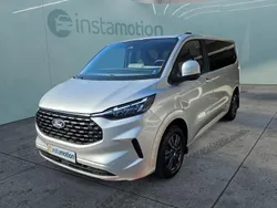 Silber Gebraucht 2024 Ford Tourneo Custom Van / Kleinbus | 50.699 €