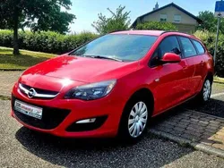 Powerrot/red Gebraucht 2016 Opel Astra Edition Kombi | 6.995 € (Fairer Preis)