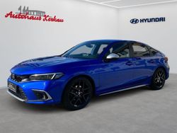 Premium crystal blue metallic (metallic) Gebraucht 2023 Honda Civic Hybrid Limousine | 29.990 € (Guter Preis)