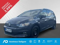 Delfingrau metallic Gebraucht 2024 VW Touran Comfortline Van / Kleinbus | 36.900 € (Etwas zu teuer)