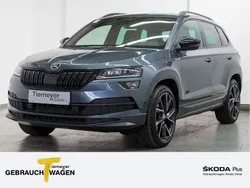 Grau Gebraucht 2020 Skoda Karoq SportLine SUV | 27.940 € (Fairer Preis)