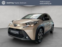 Ginger beige / night sky black Gebraucht 2024 Toyota Aygo X Team SUV | 17.350 €