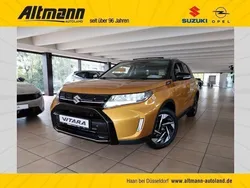 Solar yellow pearl / cosmic bl Gebraucht 2024 Suzuki Vitara Comfort+ SUV | 31.960 €