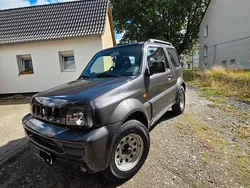 Grau Gebraucht 2012 Suzuki Jimny Style SUV | 11.500 € (Etwas zu teuer)