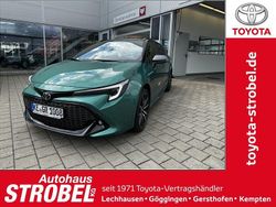 Super green metallic, dach schwarz Gebraucht 2024 Toyota Corolla Basis Kombi | 29.980 € (Fairer Preis)