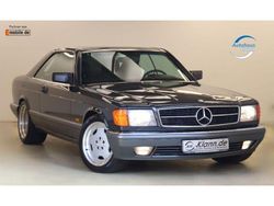 Blauschwarz (metallic) Gebraucht 1990 Mercedes 500 AMG Coupé | 34.999 €