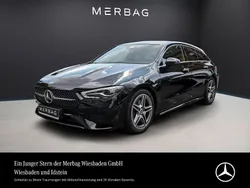 Kosmosschwarz Gebraucht 2024 Mercedes CLA200 AMG Line Premium Coupé | 38.790 € (Fairer Preis)