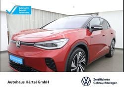 Kings red, metallic Gebraucht 2025 VW ID.4 GTX SUV | 47.300 € (Etwas zu teuer)