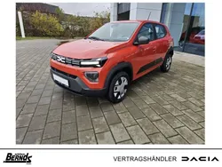 Brick red Neu 2024 Dacia Spring Expression Kleinwagen | 15.498 € (Fairer Preis)