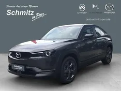 Grau Gebraucht 2024 Mazda MX30 Exclusive-Line SUV | 28.499 € (Fairer Preis)