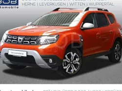 Arizonaorange metal (orange) Gebraucht 2022 Dacia Duster Prestige SUV | 22.870 € (Fairer Preis)