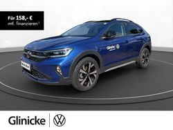 Reef blue metallic / schwarz Gebraucht 2024 VW Taigo Style SUV | 23.970 € (Fairer Preis)