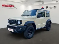 Chiffon/ bluish black pearl Gebraucht 2023 Suzuki Jimny Comfort SUV | 27.880 € (Guter Preis)