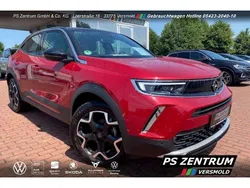Rot (metallic) Gebraucht 2022 Opel Mokka-e Ultimate SUV | 21.930 €