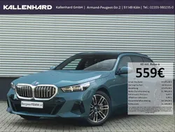 Gruen Gebraucht 2024 BMW i5 M Sport Limousine | 64.875 €