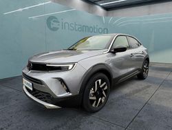 Grau Gebraucht 2023 Opel Mokka-e Elegance SUV | 22.499 € (Fairer Preis)