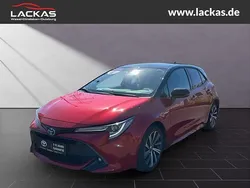 Karminarot metallic, dach schwarz Gebraucht 2021 Toyota Corolla Style | 18.949 € (Fairer Preis)