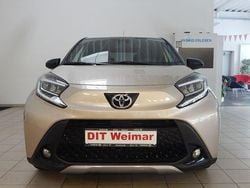 Ginger beige metallic/ night sky black Gebraucht 2024 Toyota Aygo X X-plore SUV | 17.890 € (Fairer Preis)