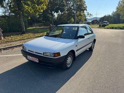 Weiß Gebraucht 1994 Mazda 323C Limousine | 1.850 €