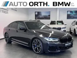 Grau Gebraucht 2022 BMW M550 Performance Limousine | 63.800 € (Teuer)