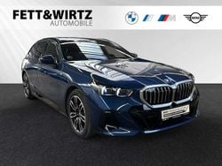 Phytonicblau metallic Gebraucht 2024 BMW i5 M Sport Kombi | 57.437 € (Superpreis)