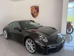 Tiefschwarz Gebraucht 2024 Porsche 992 Coupé | 114.980 € (Superpreis)