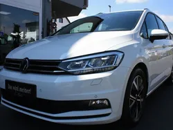 Pure white Gebraucht 2023 VW Touran Comfortline Van / Kleinbus | 28.950 € (Fairer Preis)