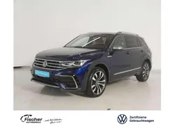 Atlanticblue metallic Gebraucht 2024 VW Tiguan Allspace R-line SUV | 46.940 € (Etwas zu teuer)