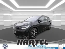 Grenadillschwarz (black), metallic Gebraucht 2023 VW ID.4 GTX SUV | 35.600 € (Fairer Preis)