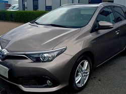 Grau Gebraucht 2016 Toyota Auris Hybrid Edition-S Kombi | 13.300 € (Fairer Preis)