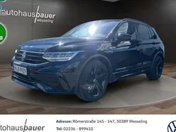 Schwarz / deep black (metallic) Gebraucht 2024 VW Tiguan R-line SUV | 39.880 € (Fairer Preis)