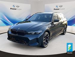 Grau Gebraucht 2024 BMW 330e Performance Kombi | 62.490 €