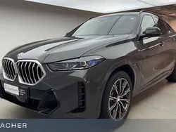 Dravitgrau metallic Gebraucht 2024 BMW X6 Comfort Edition SUV | 83.749 € (Superpreis)