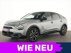 Grau Gebraucht 2023 Citroën e-C4 Shine Limousine | 20.731 € (Fairer Preis)