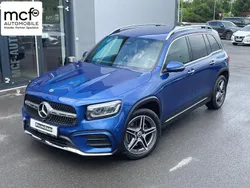 Spektralblaumetallic Gebraucht 2024 Mercedes GLB220 AMG Line Premium SUV | 44.290 € (Fairer Preis)