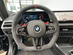 Saphirschwarz Gebraucht 2024 BMW M4 Shadowline Coupé | 126.989 €