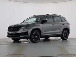 Graphitegrau metallic Gebraucht 2024 Skoda Karoq SportLine SUV | 27.889 € (Fairer Preis)