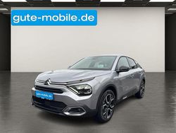 Grau Gebraucht 2024 Citroën e-C4 Shine Limousine | 22.990 € (Fairer Preis)