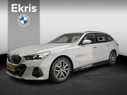 Grau Gebraucht 2025 BMW i5 M Sport Kombi | 58.900 €