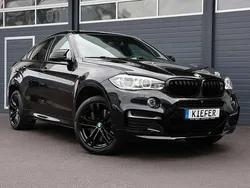 Black sapphire metallic (475) Gebraucht 2015 BMW X6 M SUV | 29.950 €