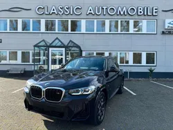 Carbonschwarz metallic Gebraucht 2024 BMW X4 Performance SUV | 63.850 € (Fairer Preis)