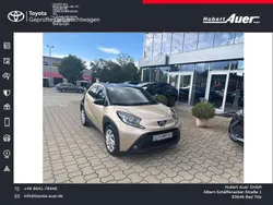 Ginger beige metallic/dach nig Gebraucht 2022 Toyota Aygo Pulse Kleinwagen | 14.490 € (Fairer Preis)