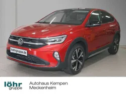 Kings red metallic Gebraucht 2024 VW Taigo Style SUV | 28.620 € (Teuer)