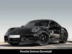 Tiefschwarzmetallic Gebraucht 2024 Porsche 911 Carrera Coupé | 137.499 €