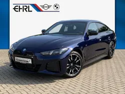 Blau Gebraucht 2024 BMW i4 Shadowline Limousine | 58.999 € (Fairer Preis)